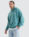 NENA AND PASADENA. GOBLIN BLUE DUAL CURVED SWEATER